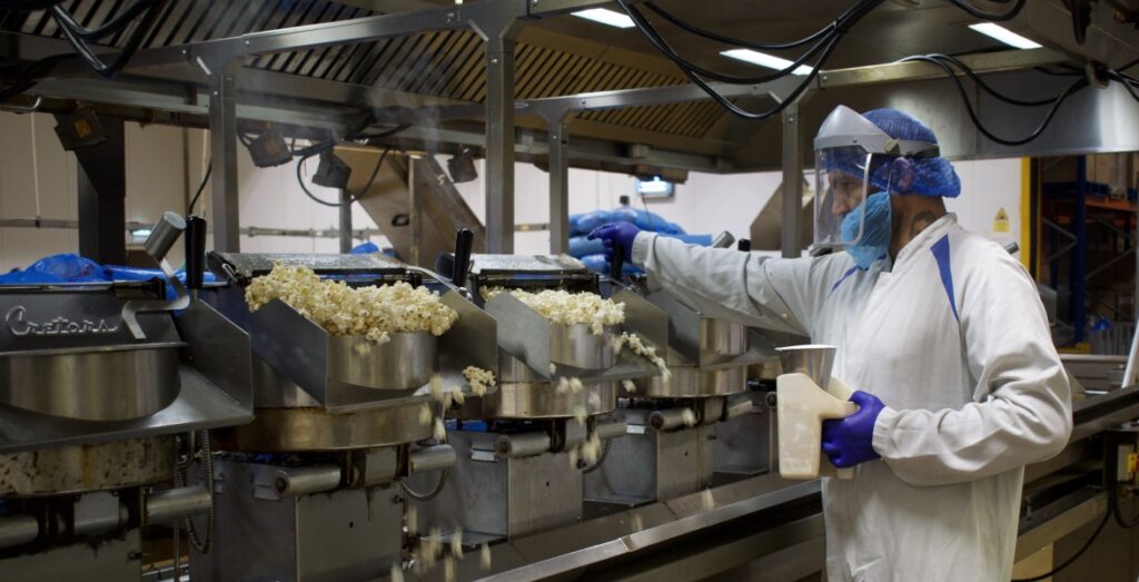 One of our Taylors Snacks popcorn experts, managing the kettles and listening for every magic pop.